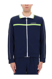 Casablanca men’s navy blue zip-up track jacket with white and lime green accents for casual wear