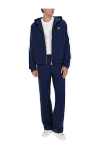 Casablanca men’s zipper hoodie in navy blue with white side stripes and a small logo on the chest
