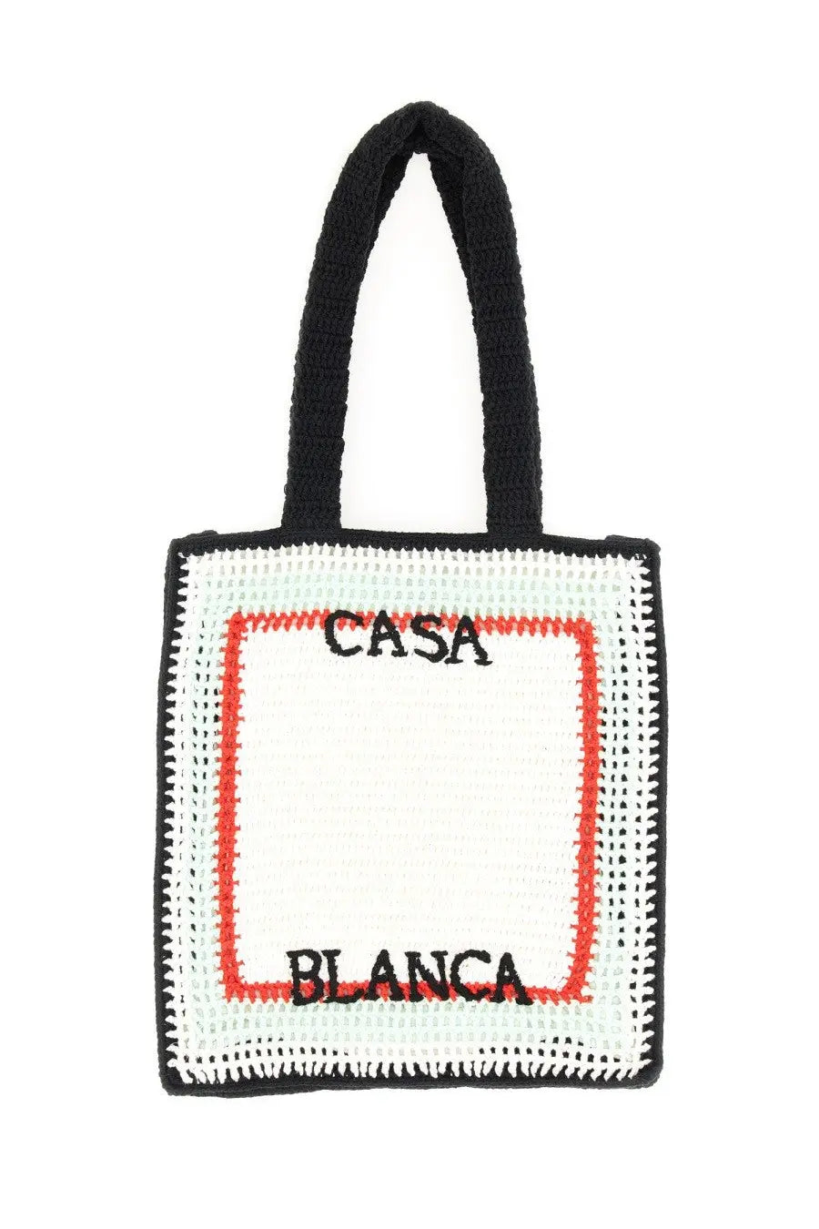 Black and white crocheted tote bag with red embroidered border and casa blanca text in unisex design