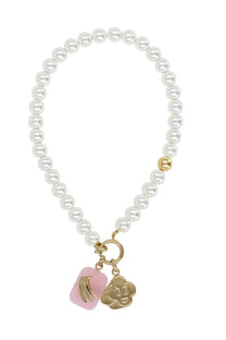 Casablanca women’s collana icon pearl white delicate white pearl bracelet with gold clasp and pink enamel charms