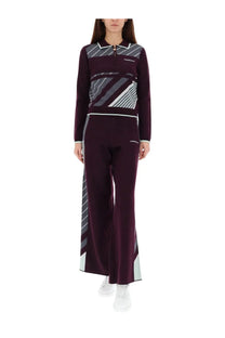 Casablanca women’s diagonal tennis pants purple with maroon fabric and gray white geometric diagonal stripe pattern