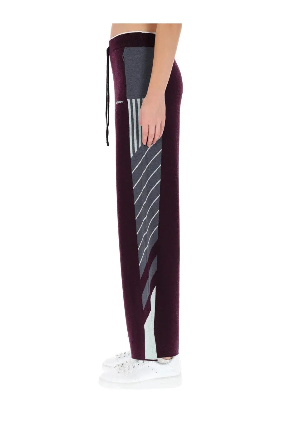 Casablanca women’s diagonal tennis pants in maroon velour with bold gray and white geometric stripe side panel