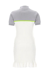 A stylish white and gray ribbed knit Casablanca women’s polo shirt dress with lime green stripe and ruffled hem
