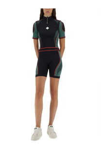 Casablanca women’s seamless black athletic shorts with teal two-piece set and red trim details for sports use