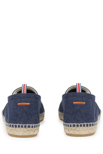 Navy blue canvas espadrille slip-on shoes with woven jute sole and orange stitching from castañer men’s espadrilla pablo blue