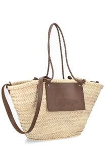 Beige woven straw tote bag with brown leather handles and cataract leather patch castañer women’s bag campania beige