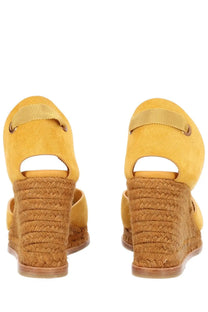 Castañer women’s espadrille wedge sandals in yellow suede with a braided jute heel and matching strap