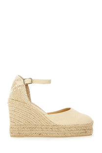 Beige espadrille wedge sandal with woven jute sole and ankle strap from Castañer women’s espadrille carol white collection