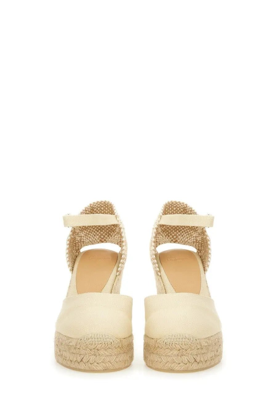 Cream-colored castañer women’s espadrille wedge sandals with woven jute straps and braided rope sole