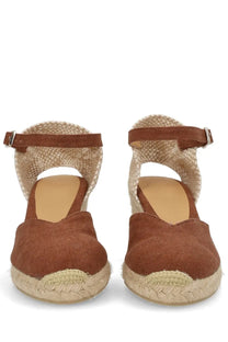 Brown suede espadrille wedge sandals with woven jute straps and braided rope sole by castañer in beige