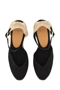 Castañer women’s espadrille wedge sandals in black canvas with beige woven strap and silver buckle