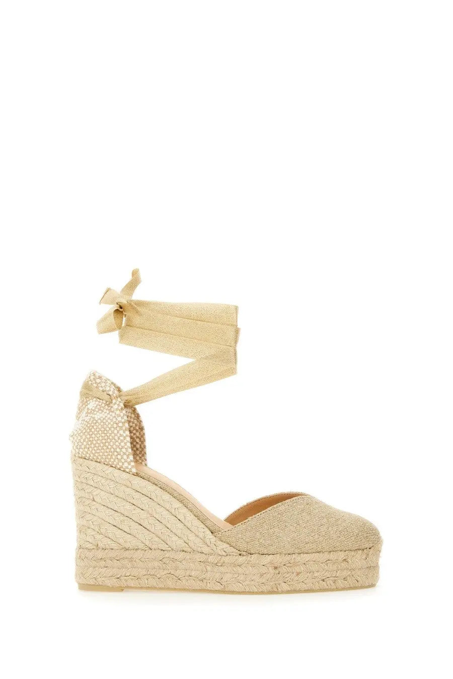 Beige woven espadrille wedge sandal with textured upper and ankle strap by Castañer women’s espadrille clear gold