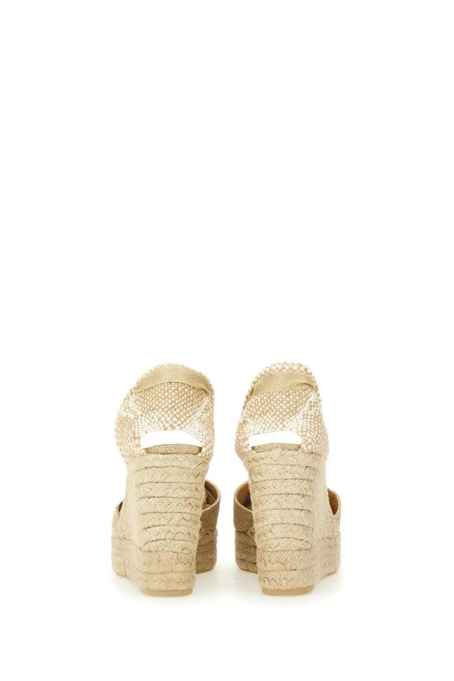 Beige woven espadrille wedge sandals with braided rope heel and ankle strap from castañer women’s espadrille clear gold