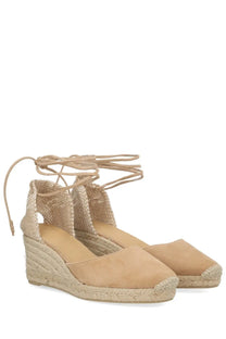 Castañer women’s beige suede espadrille wedge sandals with woven jute straps and lace-up ankle ties