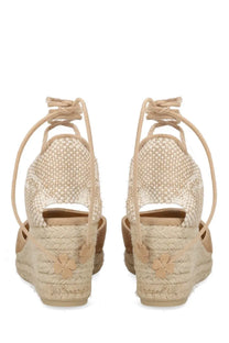 Castañer women’s beige woven espadrille wedge sandals with lace-up straps and embroidered flower details