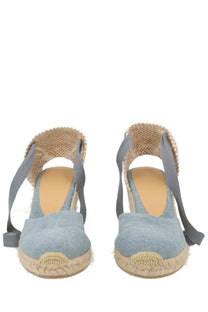 Castañer women’s espadrille wedge sandals in light blue denim with gray fabric straps and woven jute sole