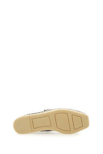 Beige rubber sole with textured reinforced pattern and embossed logo on castañer women’s espadrille pepa black back side