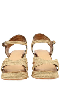Castañer women’s beige woven espadrille wedge sandals with braided strap design and metallic buckle accents