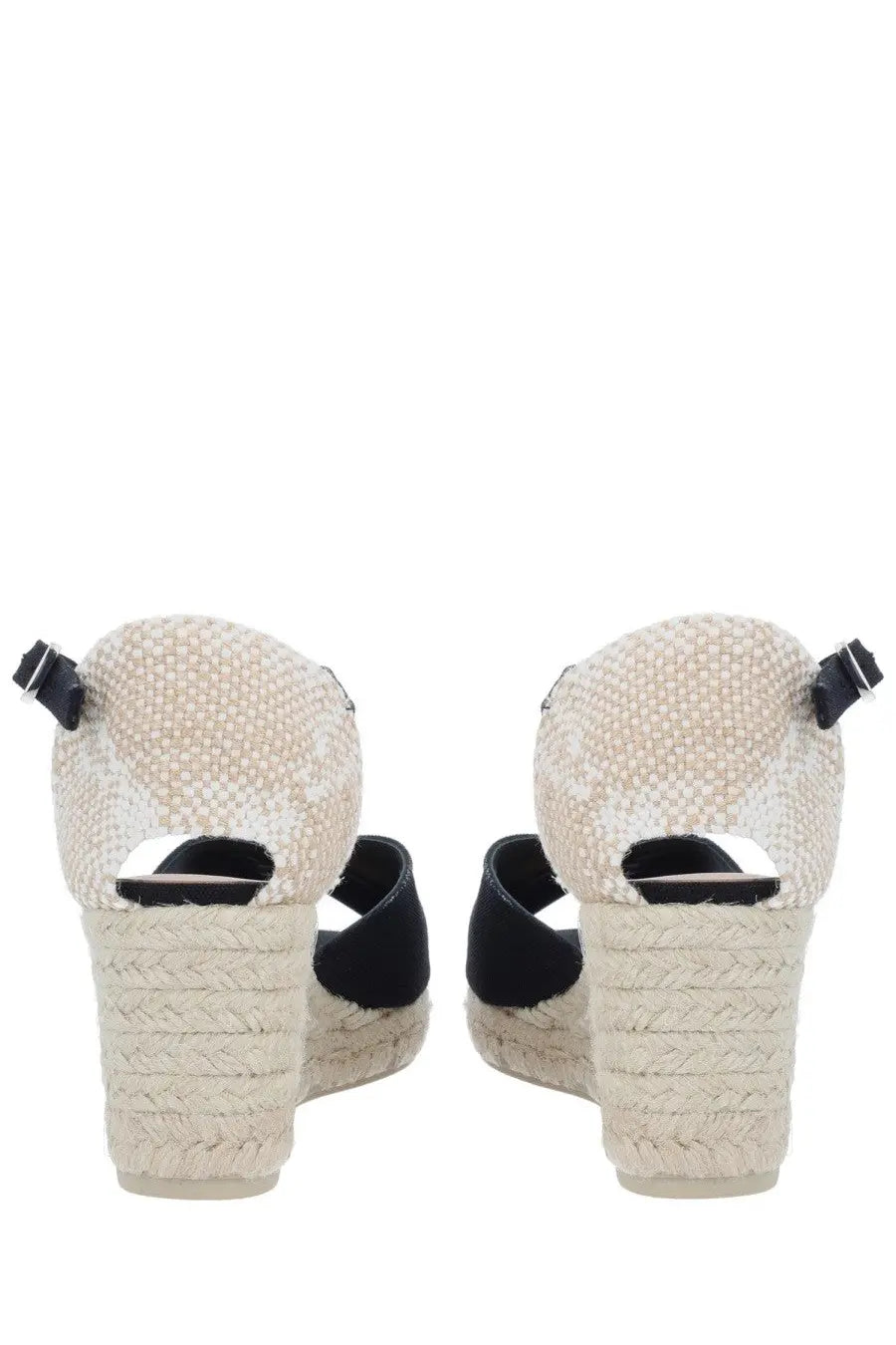 Castañer women’s espadrille wedge sandals in beige woven material with black fabric straps and buckle details