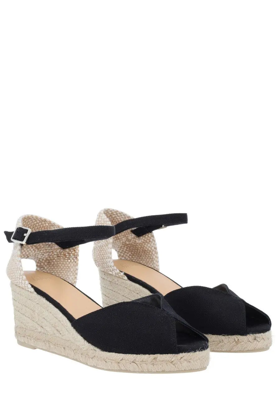 Castañer women’s espadrille black wedge sandals with woven jute sole and ankle strap shown from the back side