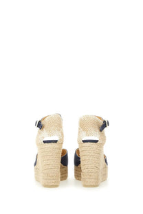 Castañer women’s espadrille wedge sandals in beige and navy blue with woven rope heels and ankle straps