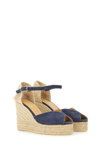 Navy blue denim wedge sandals with woven espadrille sole and ankle strap by Castañer women’s espadrille white blue