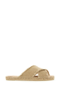 Castañer women’s beige canvas slide sandal with frayed edge and espadrille-style sole