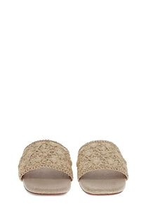 Castañer women’s beige woven straw slide sandals with floral pattern and flat sole for casual wear