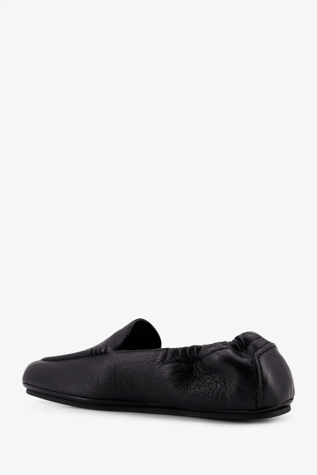 Celine mens adam black leather slip on loafer with sleek minimalist design and elasticized heel for comfort