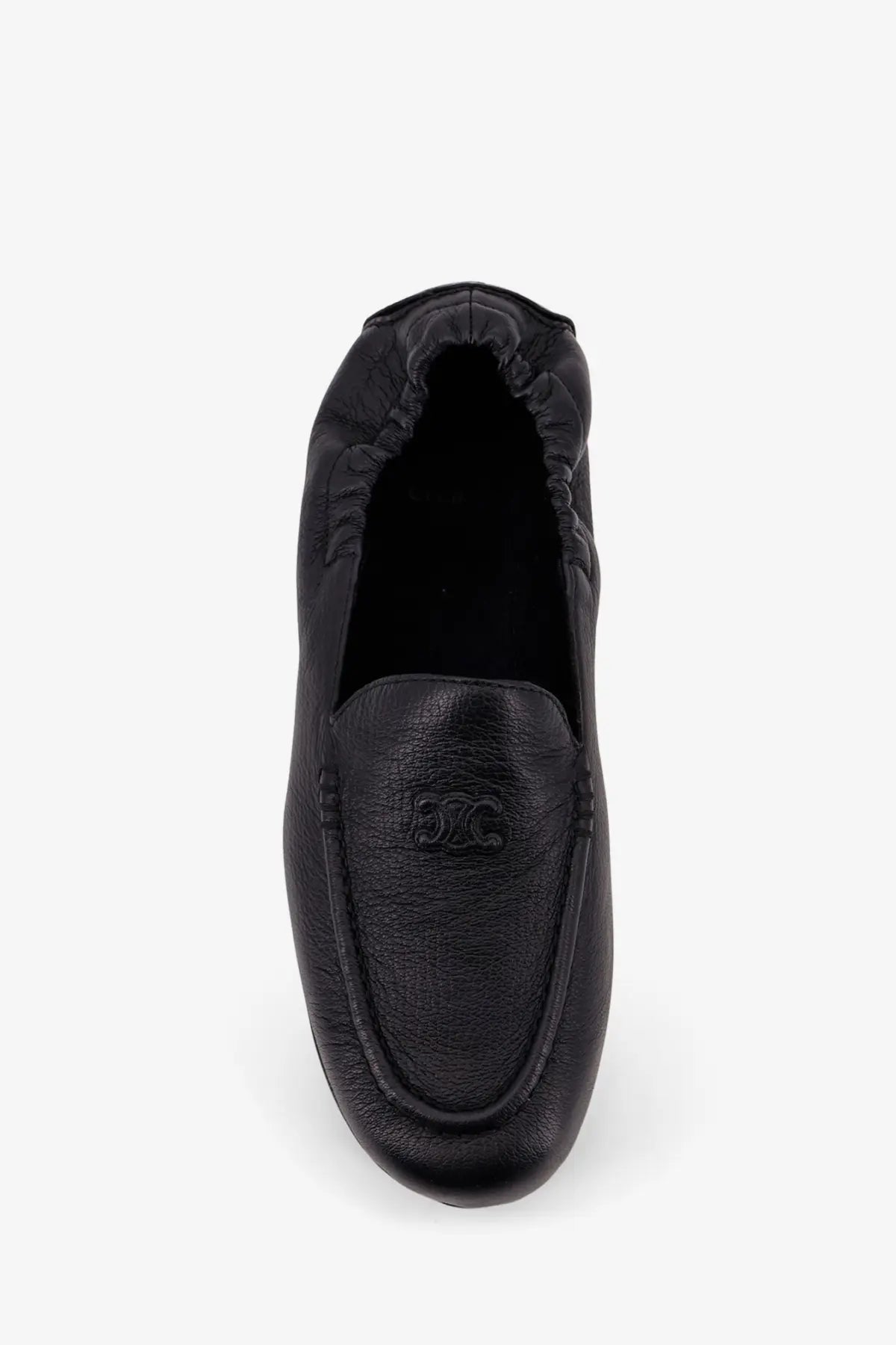 Celine men’s Adam black leather slip-on loafer with subtle embossed logo on the vamp for stylish casual wear