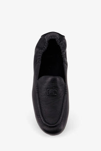Celine men’s Adam black leather slip-on loafer with subtle embossed logo on the vamp for stylish casual wear