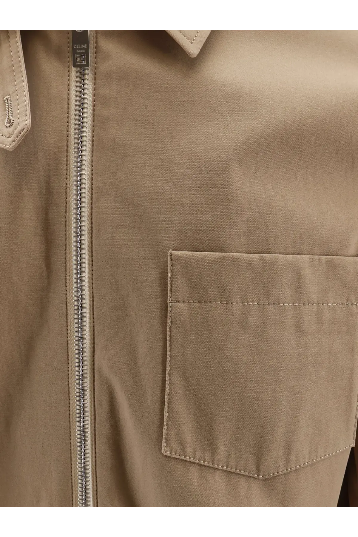 Celine men’s beige cotton trench coat with silver zipper and matching pocket featuring subtle stitching details