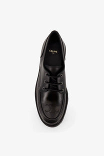 Black celine leather lace-up oxford shoe with brogue detailing from men’s derby margaret collection