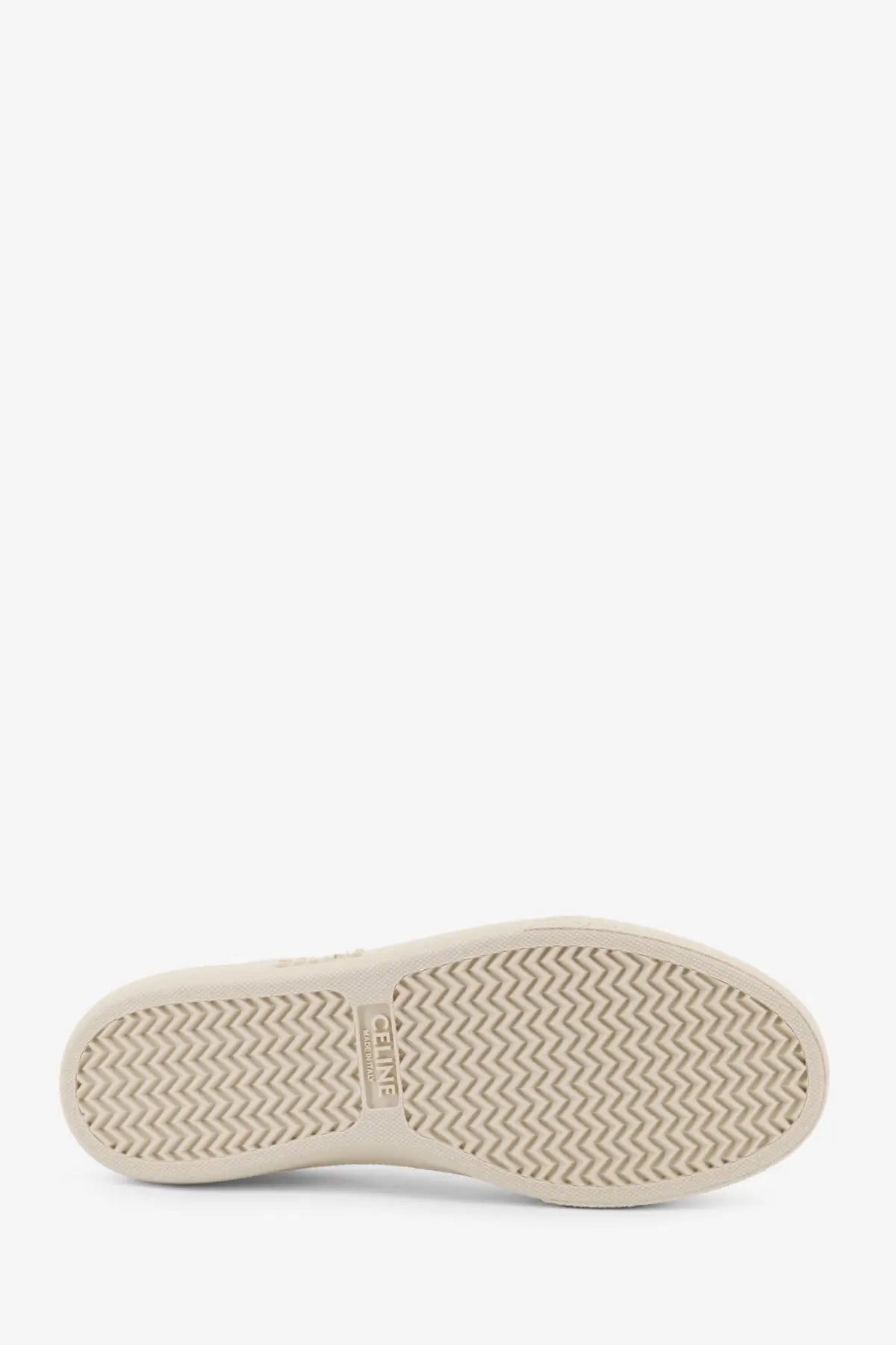 Back view of celine men’s low top white leather sneakers with beige rubber sole and embossed logo on heel