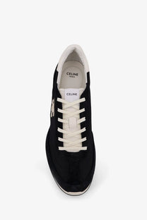 Black suede celine men’s racer sneaker with white laces and subtle embroidered logo on the side