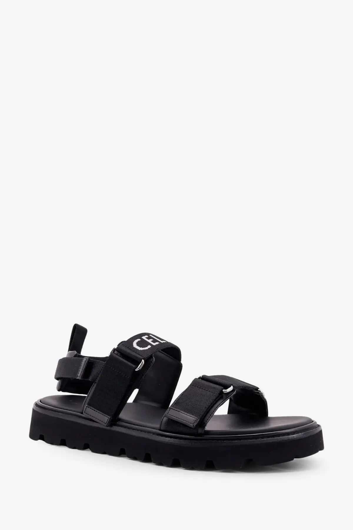 Celine men’s sandali in tela jacquard black with black canvas strap, chunky rubber sole, and silver logo detailing