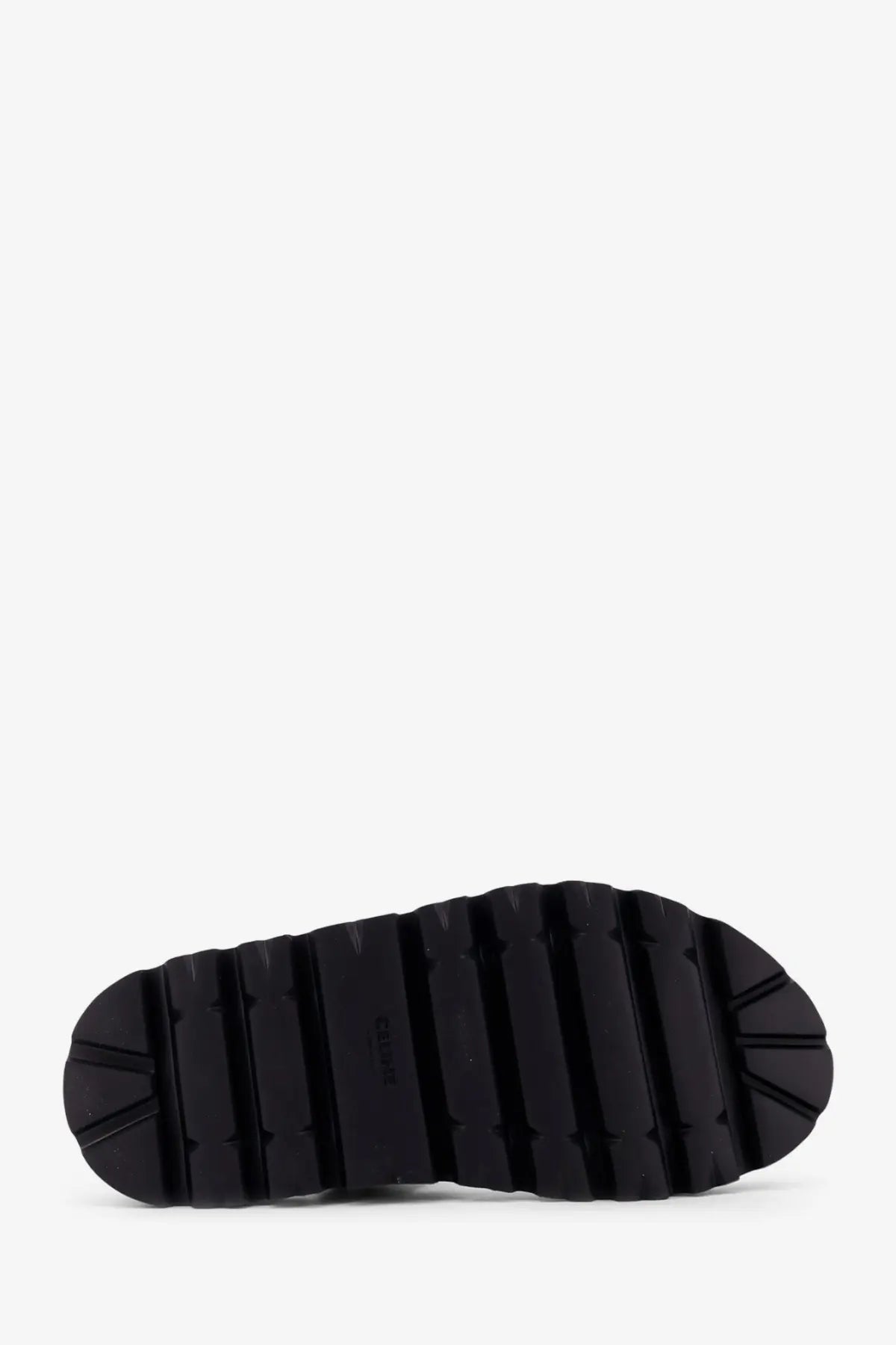 Black rubber sole with deep textured treads on the back of Celine men’s sandali in tela jacquard black