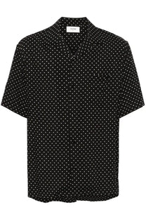 Black Celine men’s short-sleeved button-up shirt in viscose with subtle white polka dot pattern for casual wear