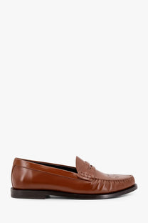 Celine men’s Vivienne brown leather loafer with polished finish and subtle perforated detailing on the toe