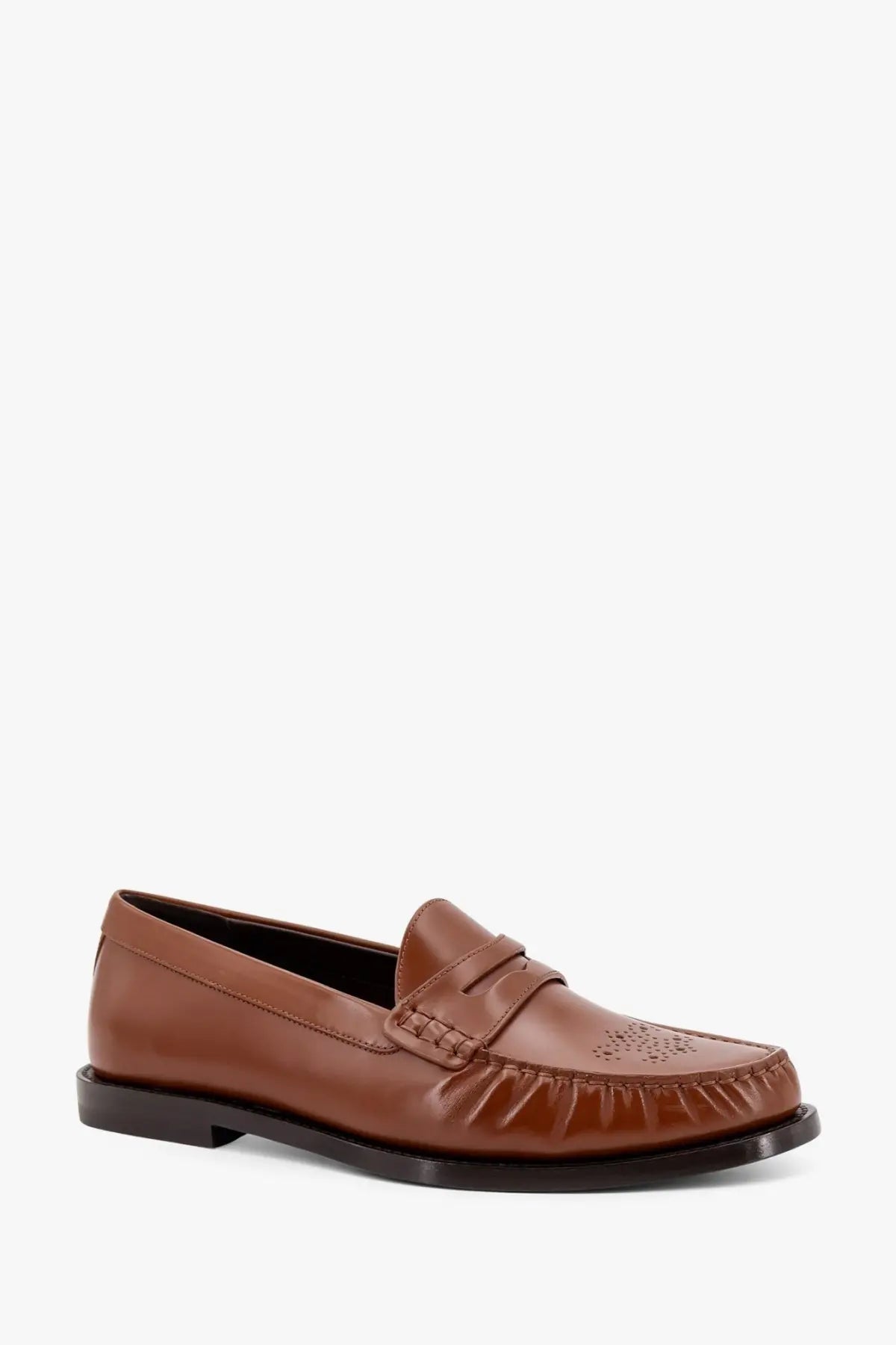 Celine men’s Vivienne brown leather loafer with polished finish, decorative perforated toe, and frayed vamp edges