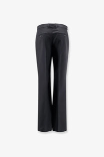 Celine men’s black wide-leg wool and mohair trousers with sleek tailored fit and subtle stitching details