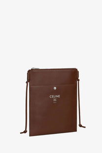 Brown leather celine paris unisex sharp crossbody pouch with silver logo and adjustable drawstring straps