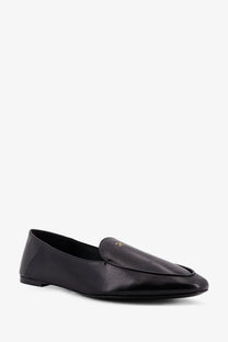Celine women’s aura slip on black leather loafer with sleek minimalist design and subtle gold logo on vamp