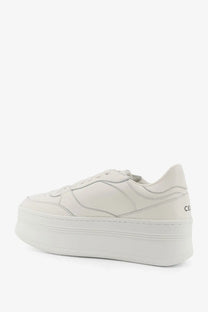 White platform sneaker with clean minimalist design and smooth leather upper from celine womens block sneakers white