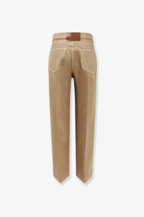 Beige high-rise straight-leg cotton trousers with brown leather brand patch at waistband from celine womens collection