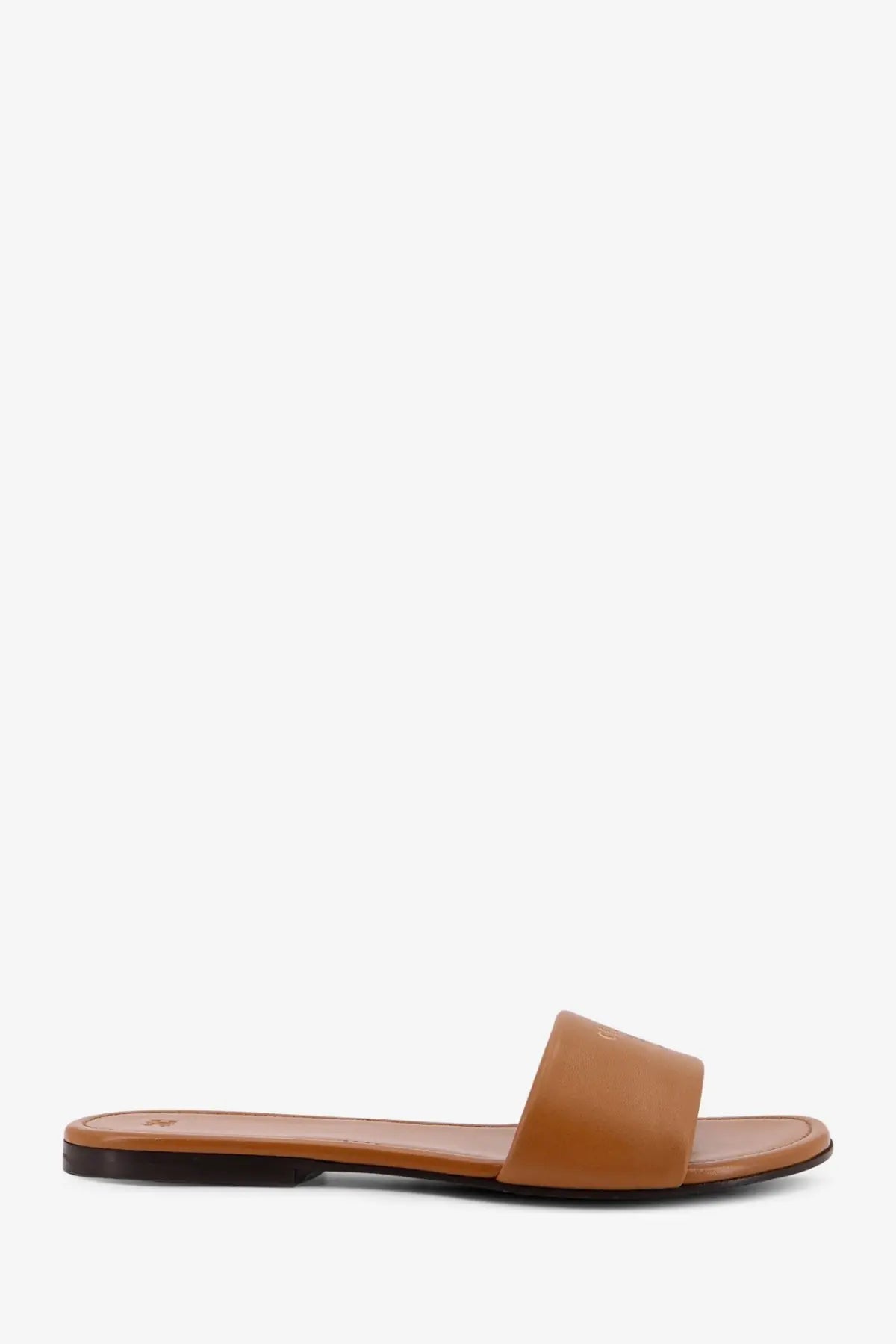 Celine women’s coast mule leather sandal in tan with minimalist design and black rubber sole