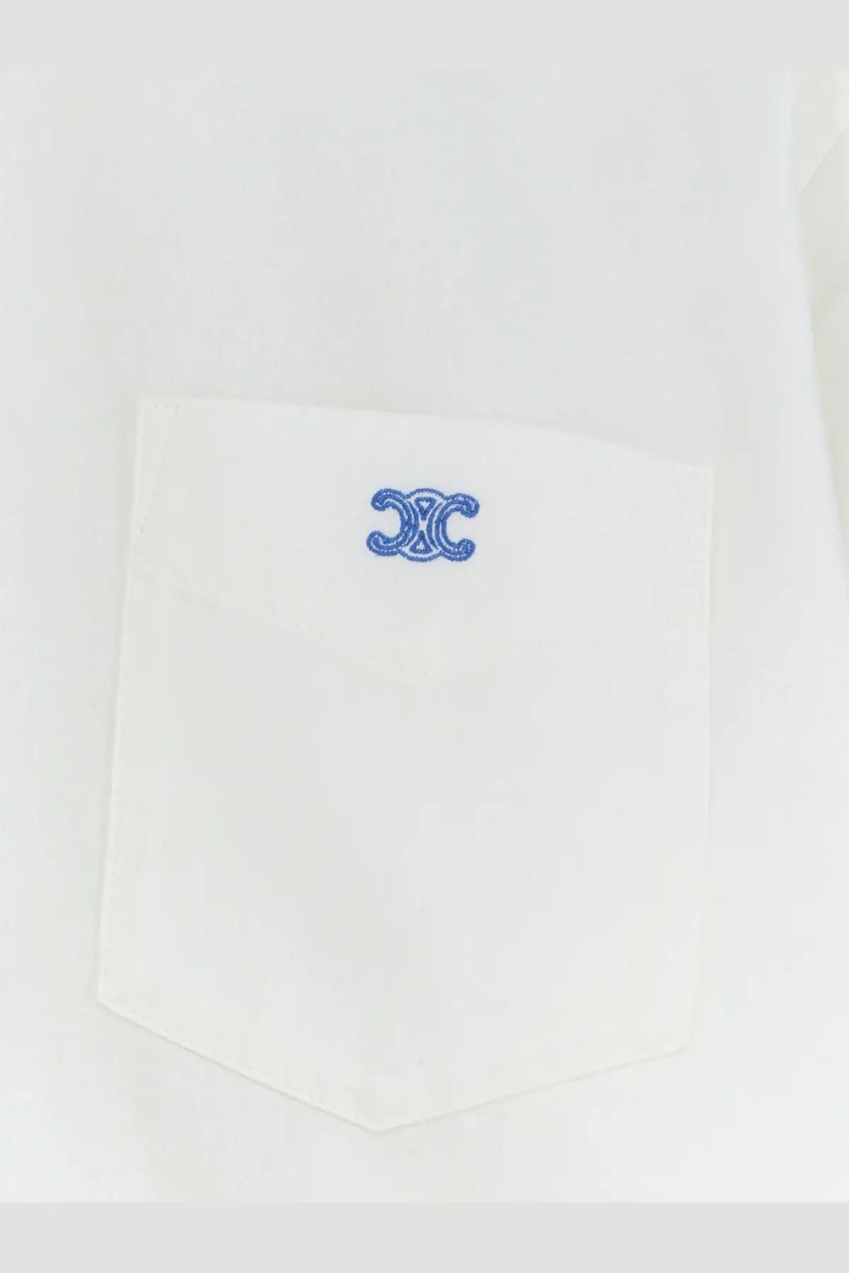 White cotton pocket with blue embroidered logo on Celine women’s cropped denim shirt white