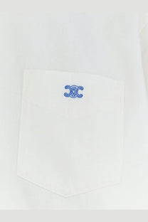 White cotton pocket with blue embroidered logo on Celine women’s cropped denim shirt white