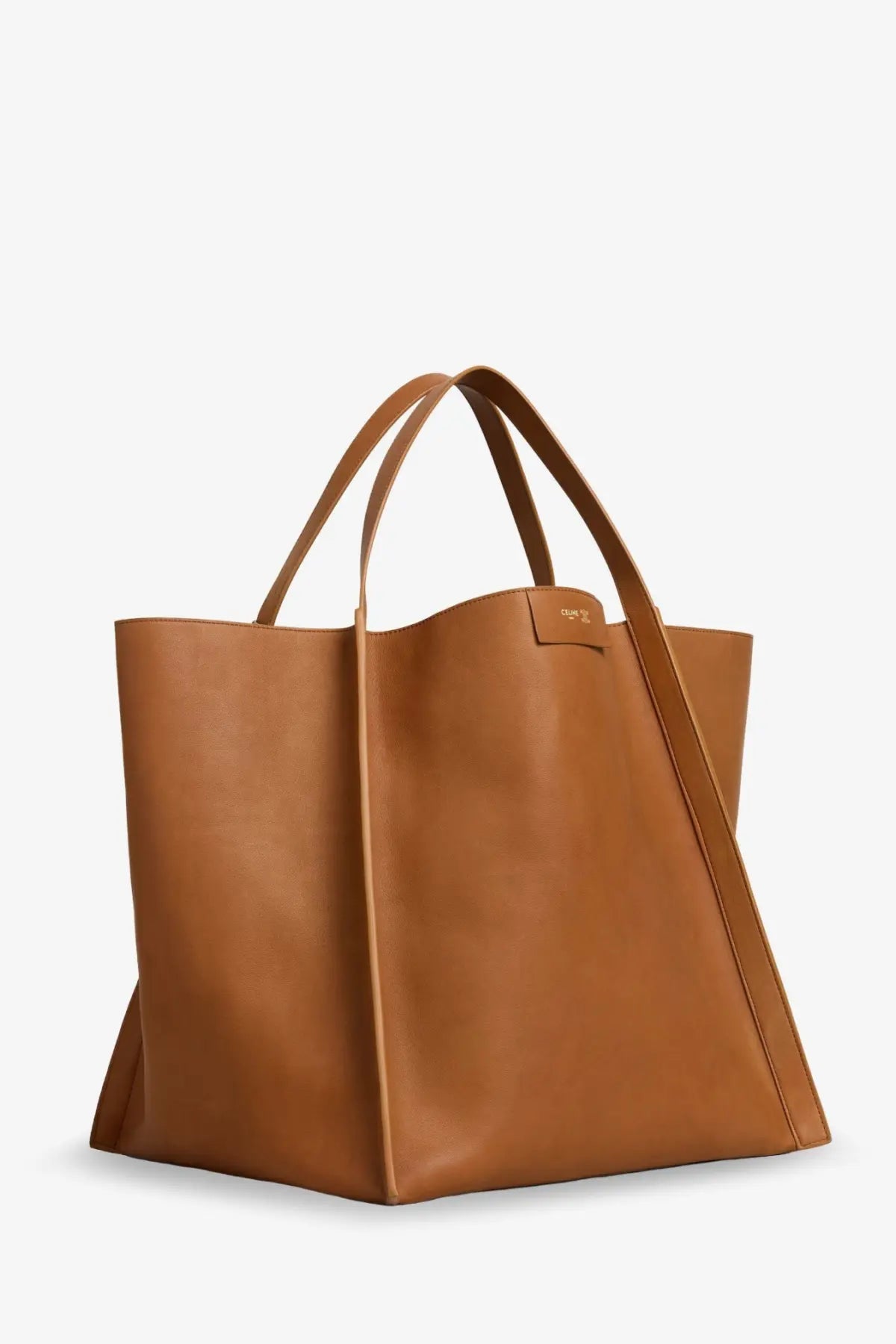 Celine women’s cube leather handbag beige tan leather tote bag with structured minimalist design and dual top handles