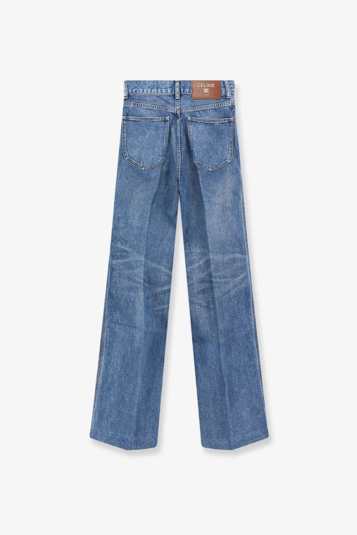 Celine women’s blue denim jeans with classic straight-leg cut and brown leather brand label at waistband back view